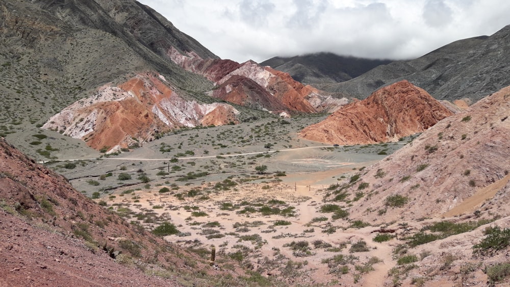 brown and gray mountains under white sky during daytime