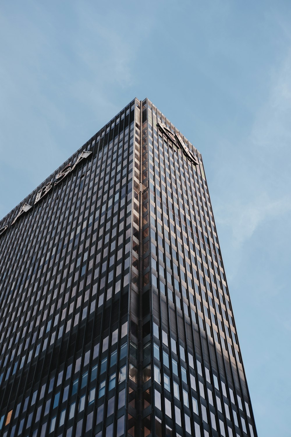 brown concrete building under blue sky during daytime