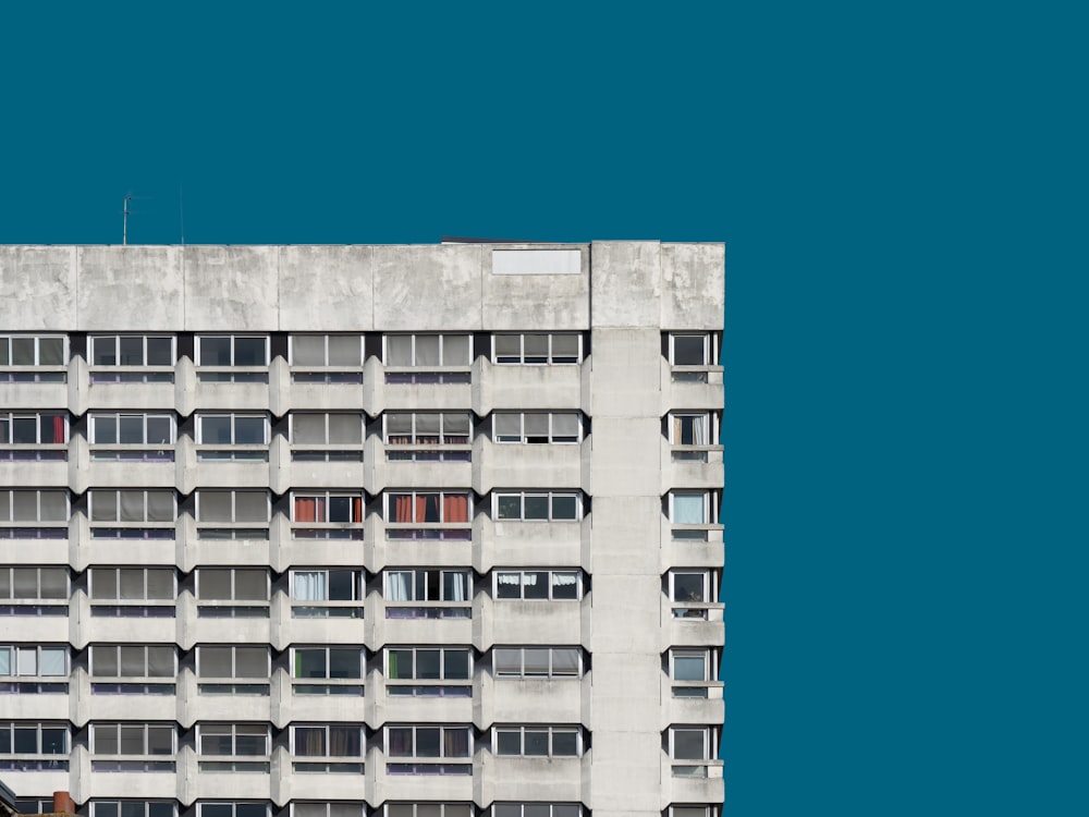 white concrete building under blue sky during daytime