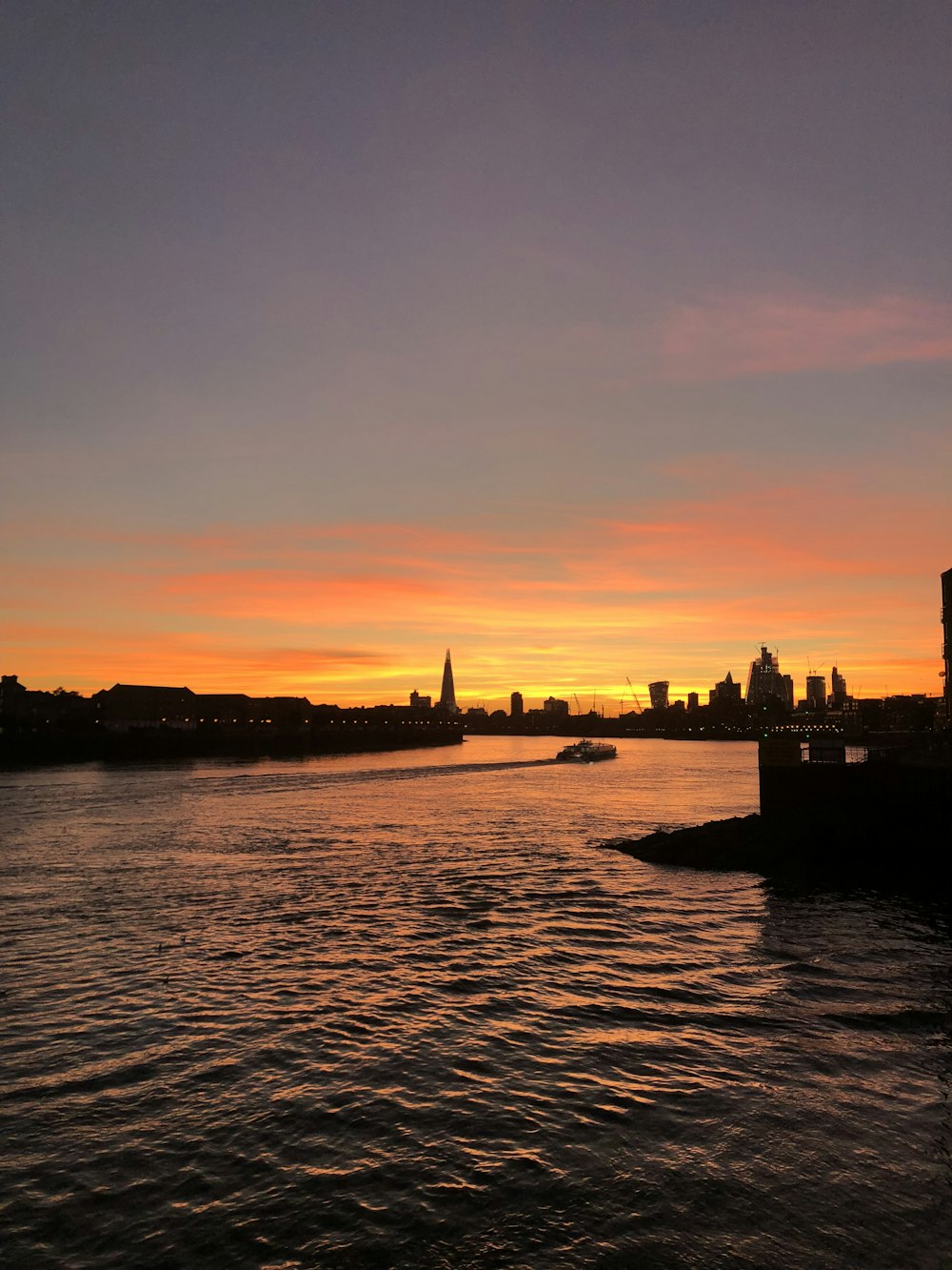 silhouette of building during sunset