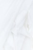 white textile in close up photography