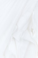 white textile in close up photography