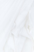 white textile in close up photography