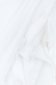 white textile in close up photography