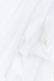 white textile in close up photography