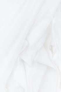 white textile in close up photography