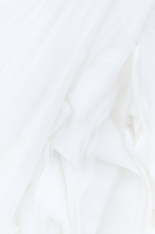 white textile in close up photography