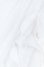 white textile in close up photography