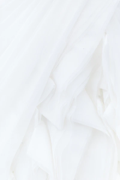white textile in close up photography