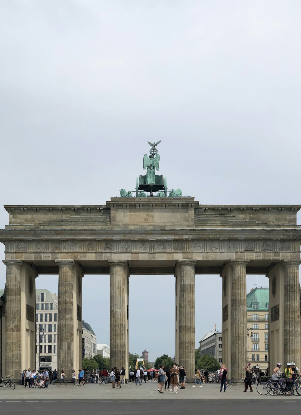 statue of man riding horse on top of building