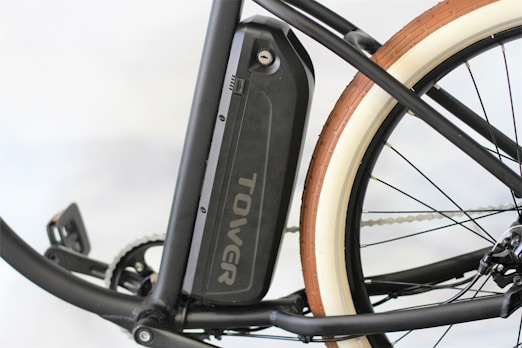 black bicycle wheel in close up photography
