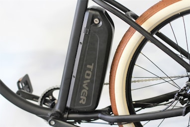 black bicycle wheel in close up photography