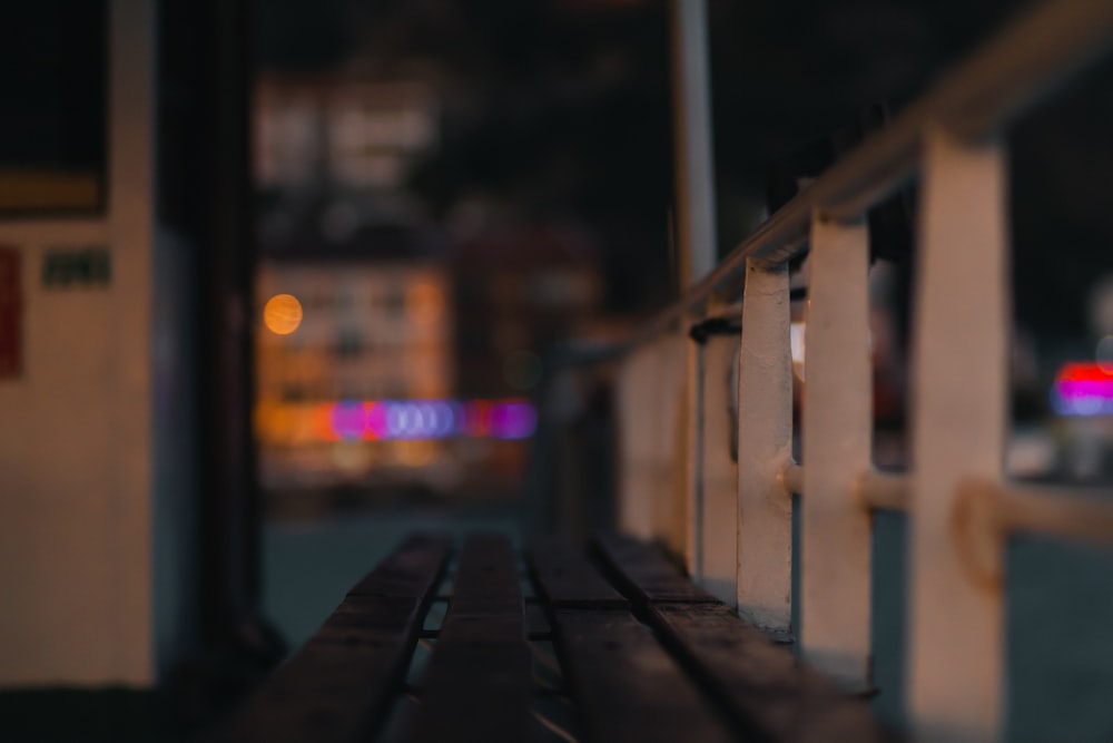 brown wooden fence during night time