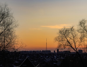 A scenic view of a city skyline at sunset, symbolizing connectivity.