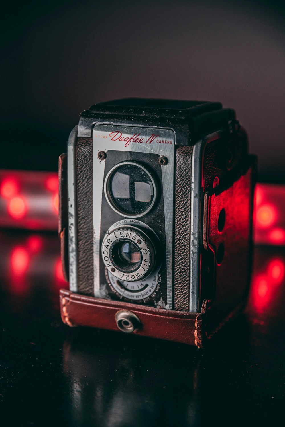 black and silver camera on table