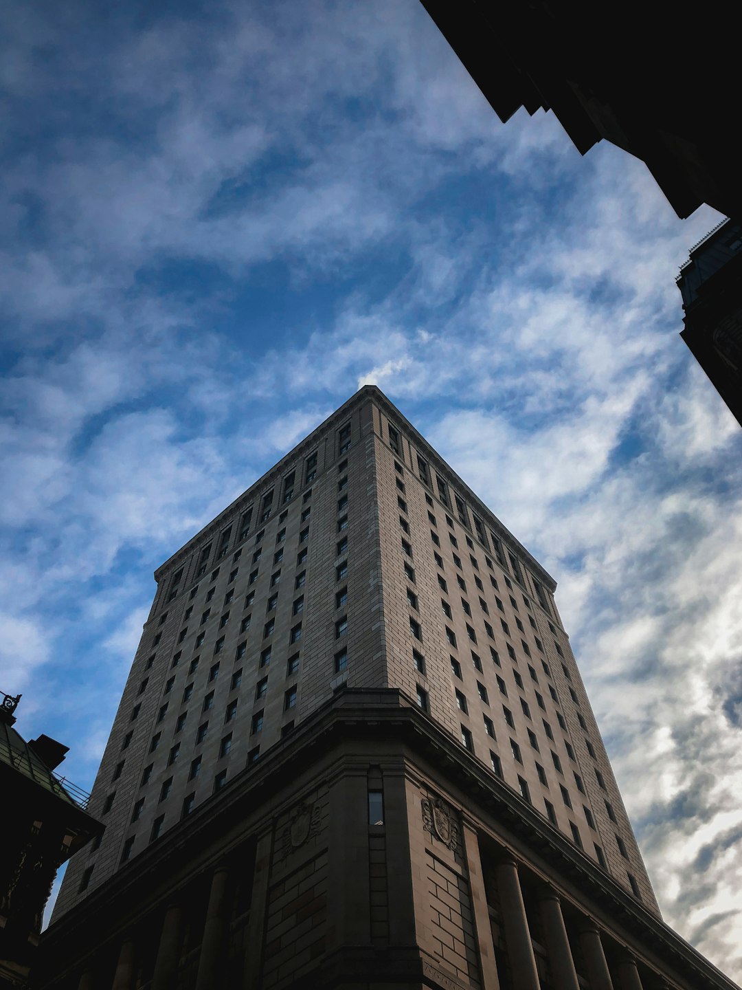 brown concrete building under blue sky during daytime