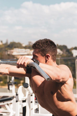 Close-up of fitness apparel on a male model during an outdoor workout.