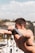 A fit individual exercising outdoors, showcasing strength and determination.