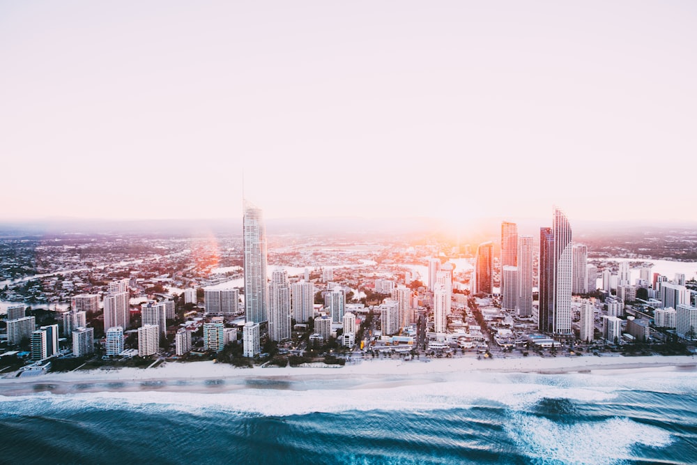 city skyline near body of water during daytime