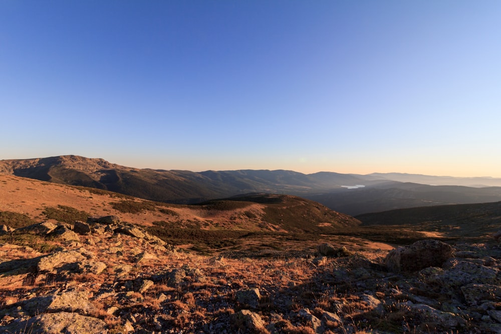 brown mountain under blue sky during daytime