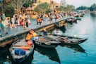 people riding on boat on river during daytime