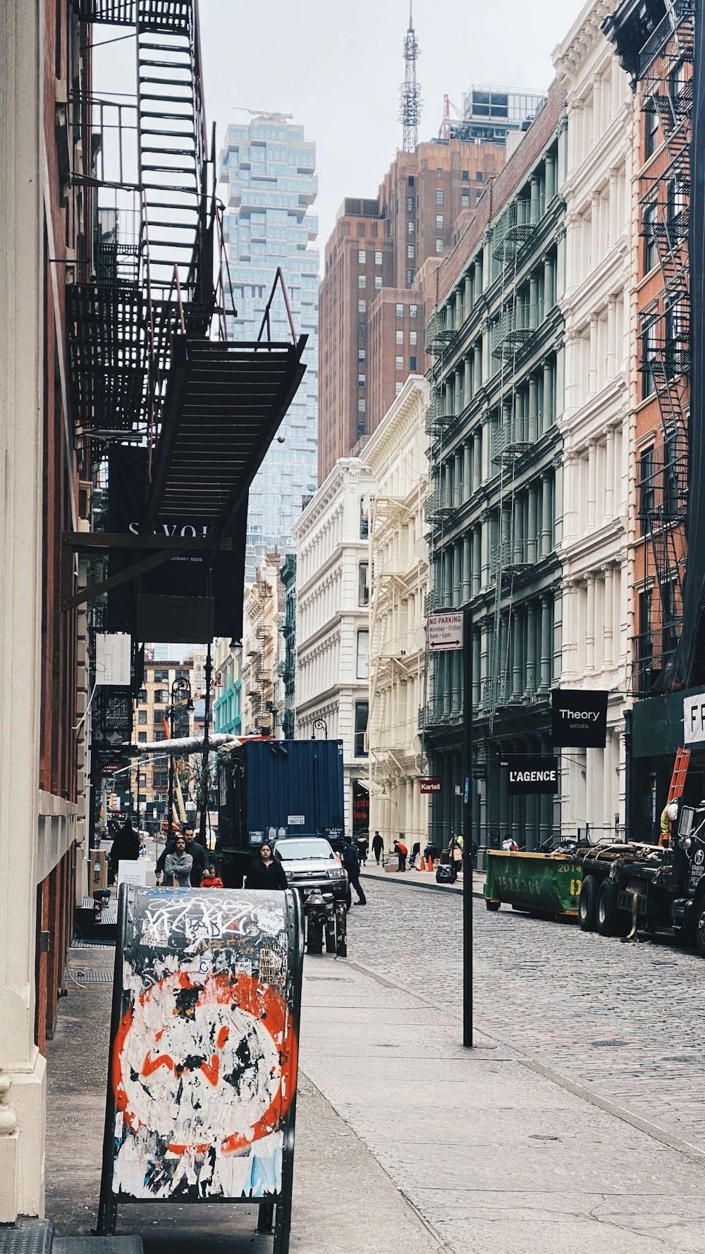 blue and white food cart on street during daytime