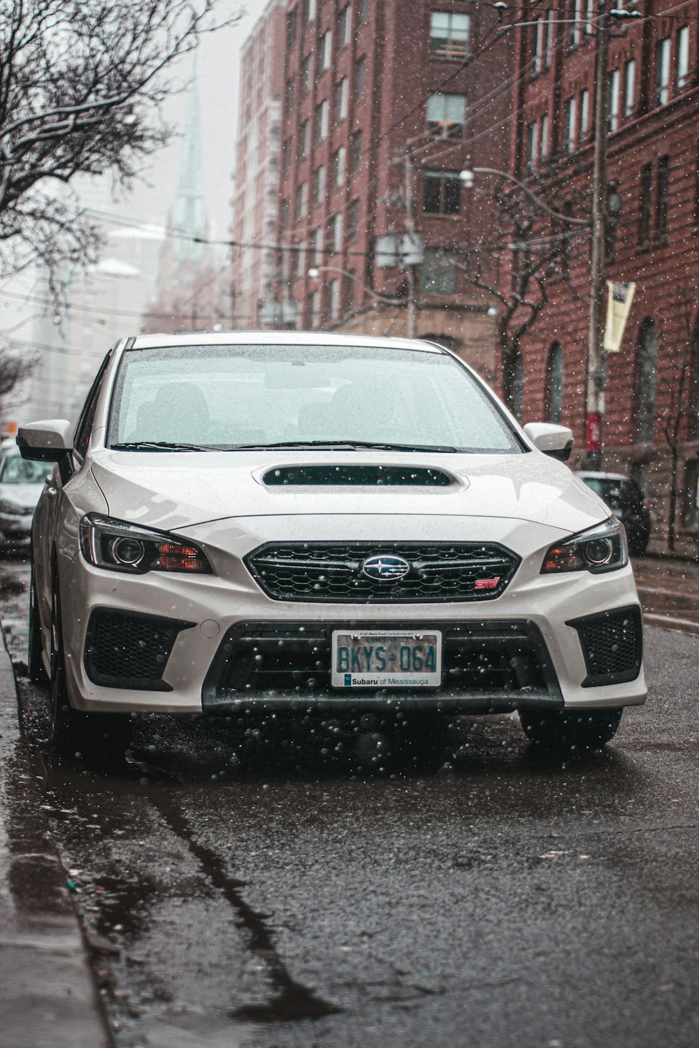 white honda car on road during daytime