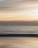 body of water during sunset