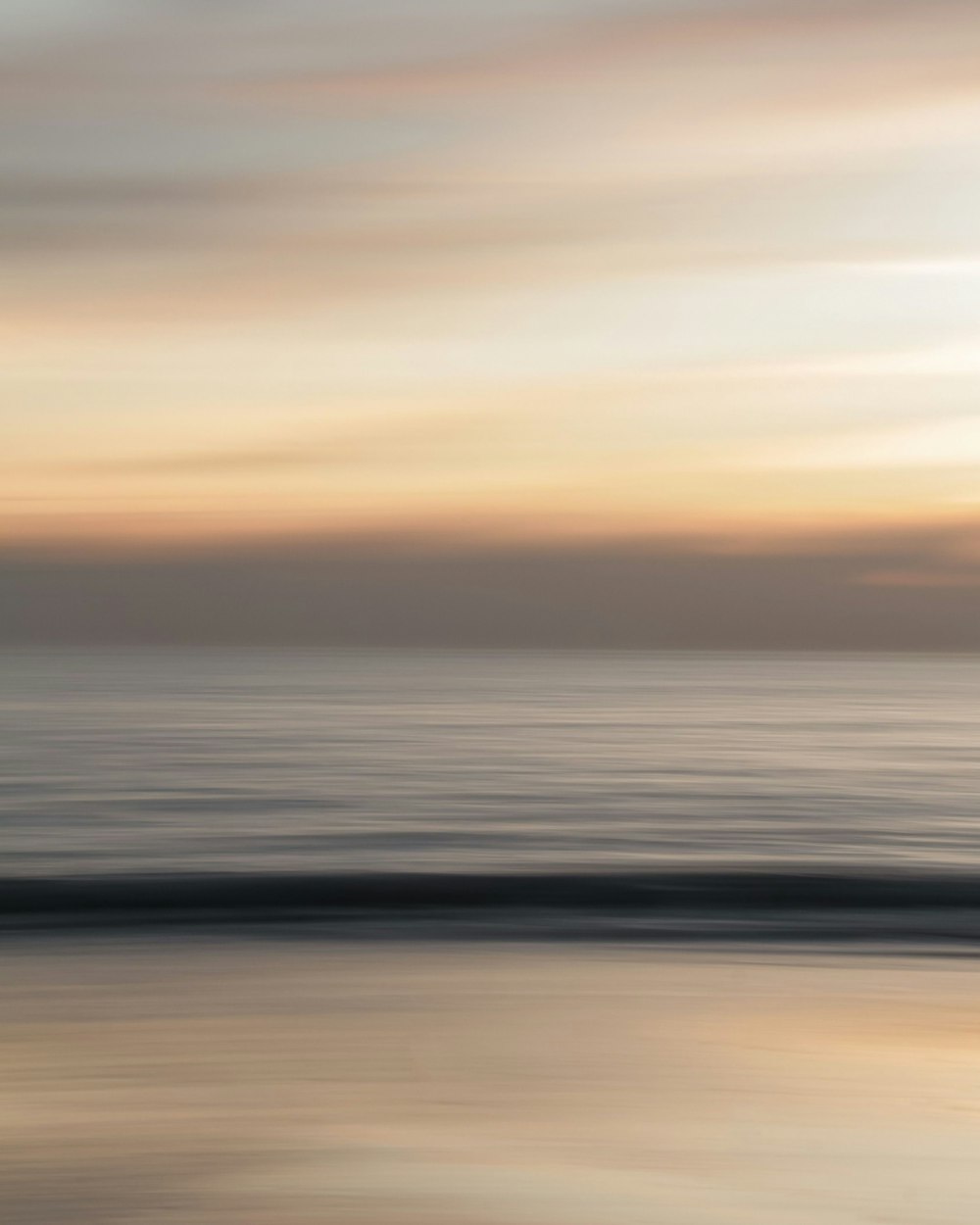 body of water during sunset