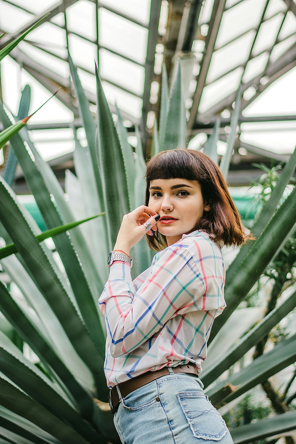 woman in white red and blue plaid dress shirt