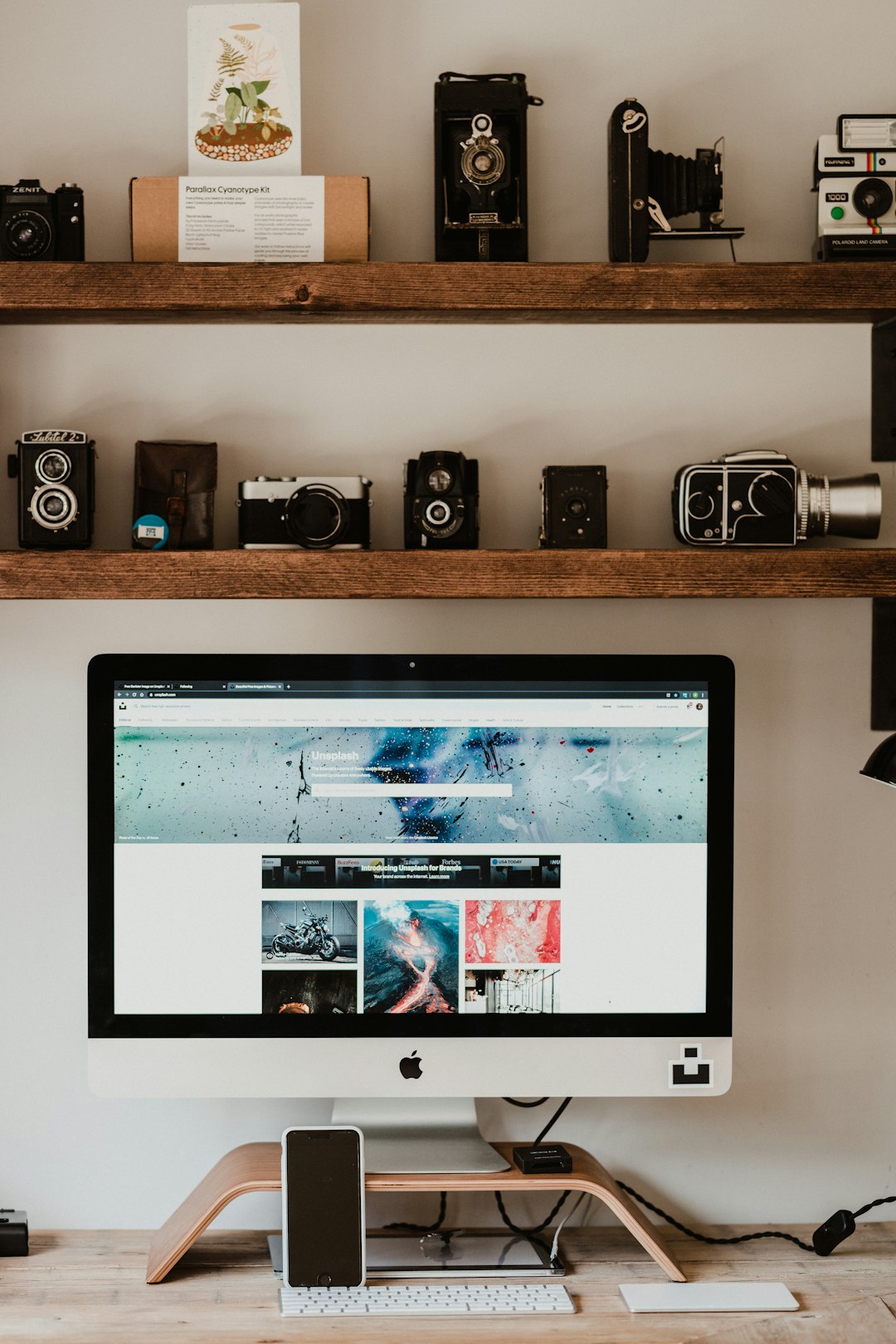 black flat screen computer monitor turned on displaying facebook