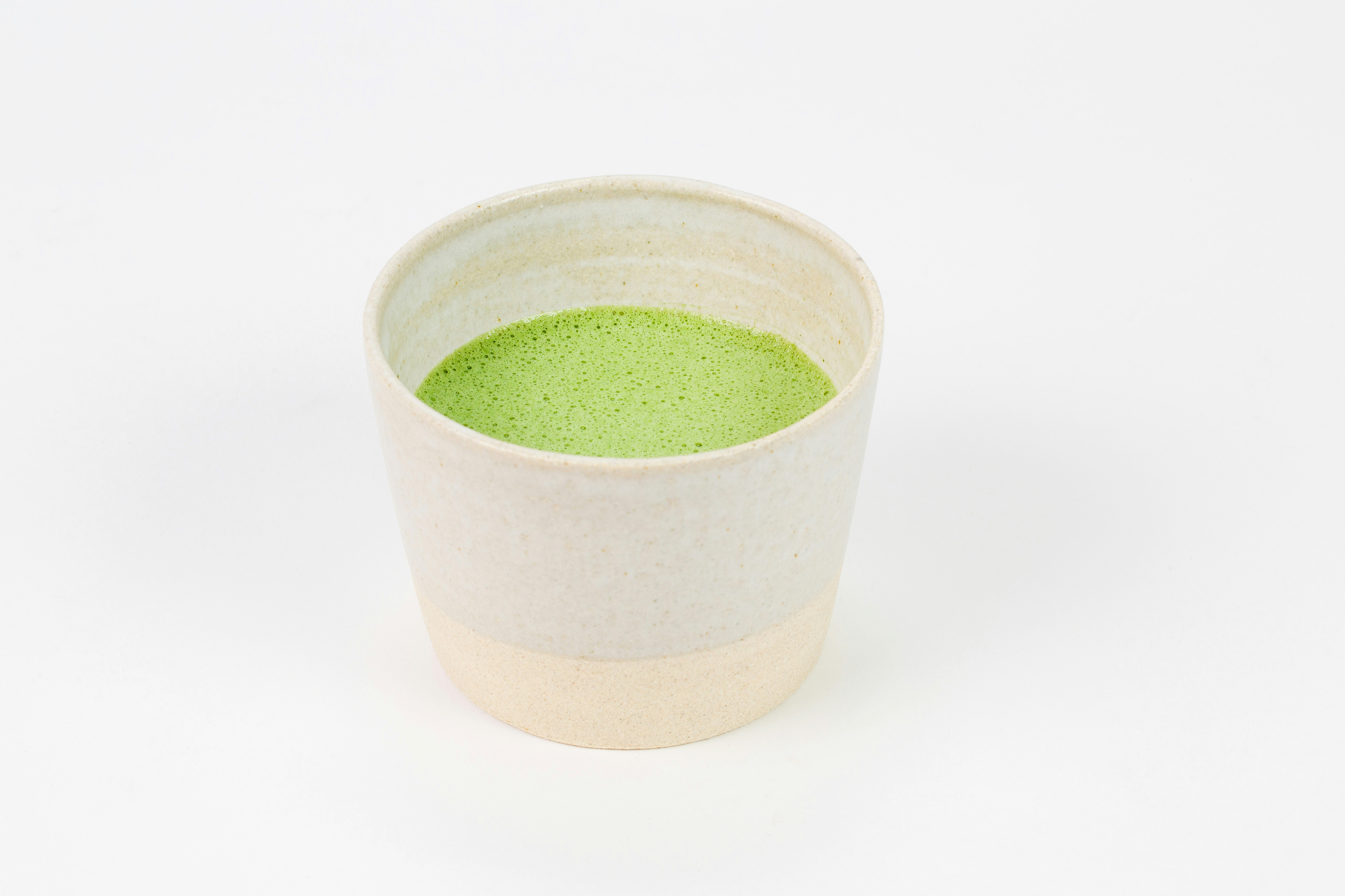 Vaso de cerámica verde y blanco