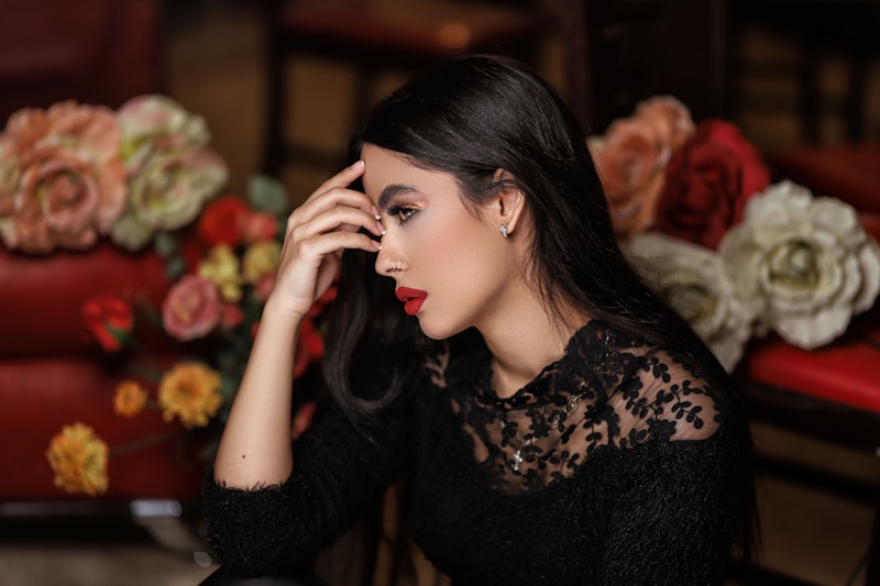 woman in black and brown floral long sleeve shirt