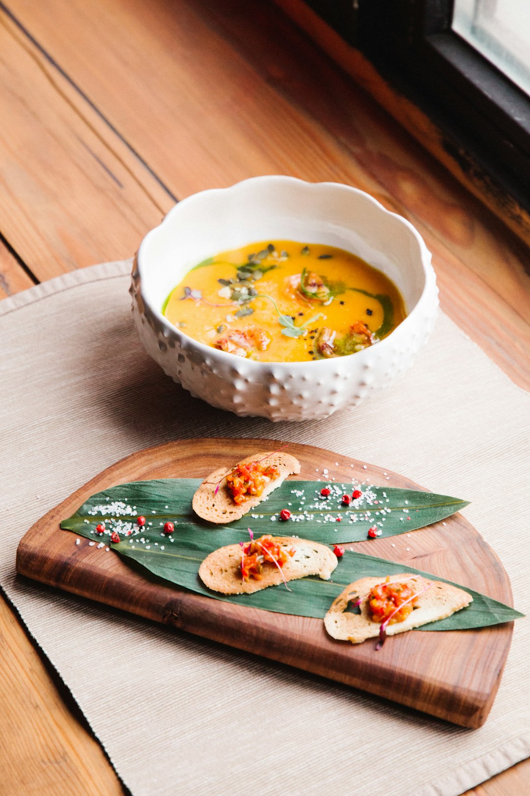 white ceramic bowl with soup