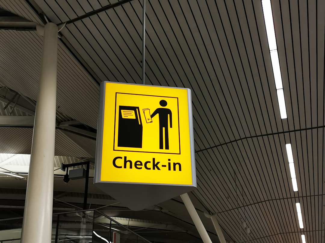 yellow and black no smoking sign,