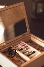 brown wooden chest box with gold and silver coins