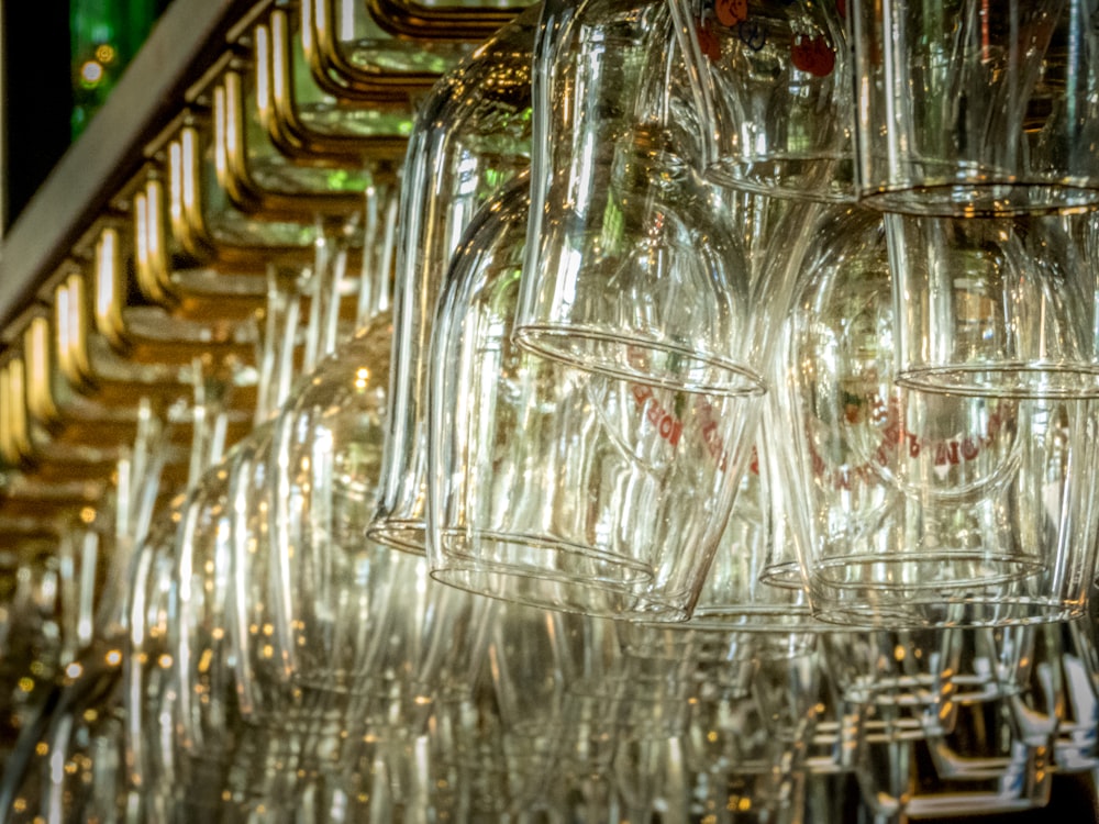 clear drinking glasses on stainless steel rack