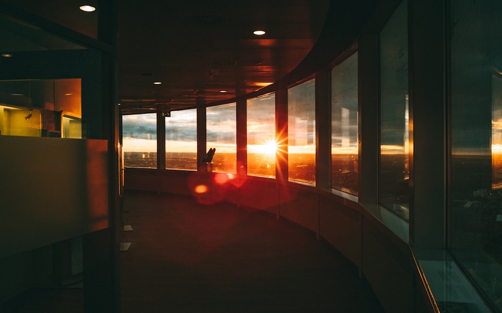 silhouette of people walking on hallway