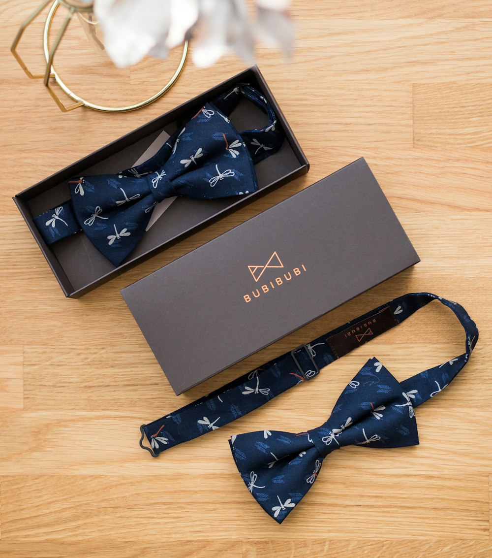 black and white bow tie on black box