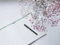 pink flowers on white paper