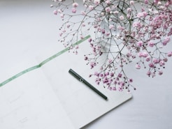 pink flowers on white paper