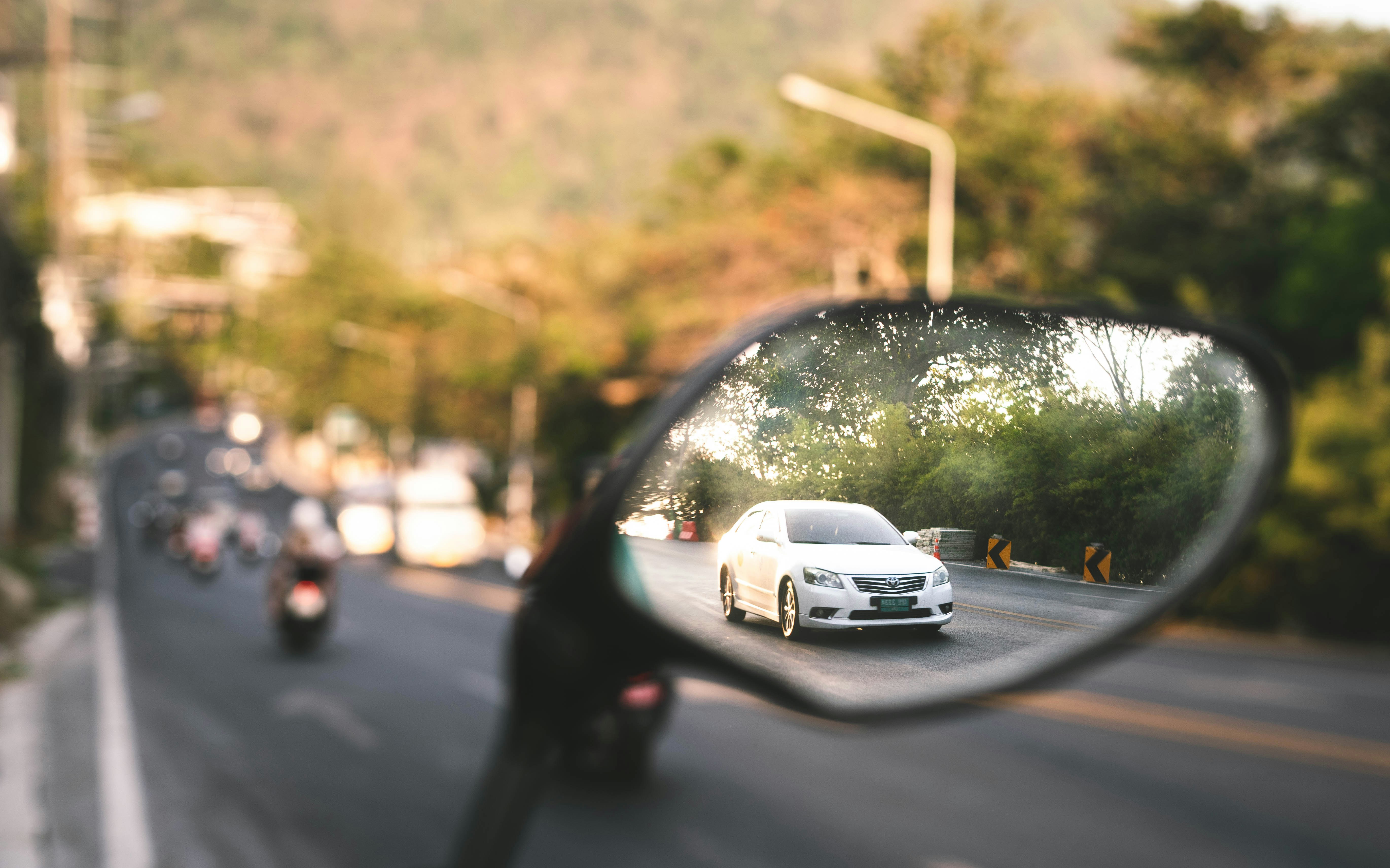white car on road during daytime