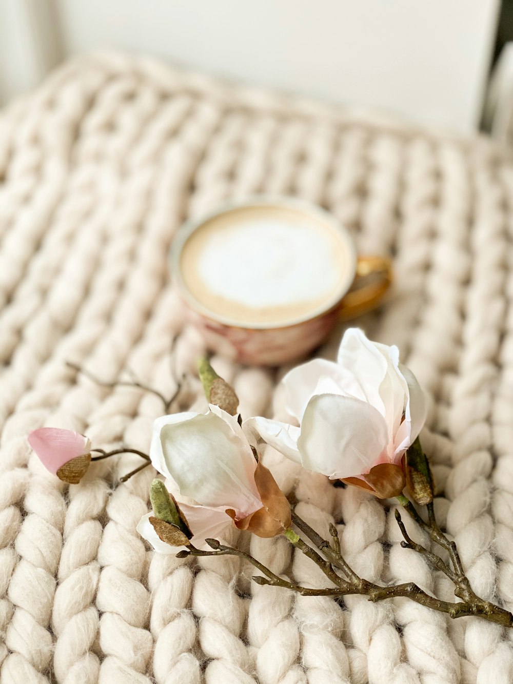 white rose on white textile