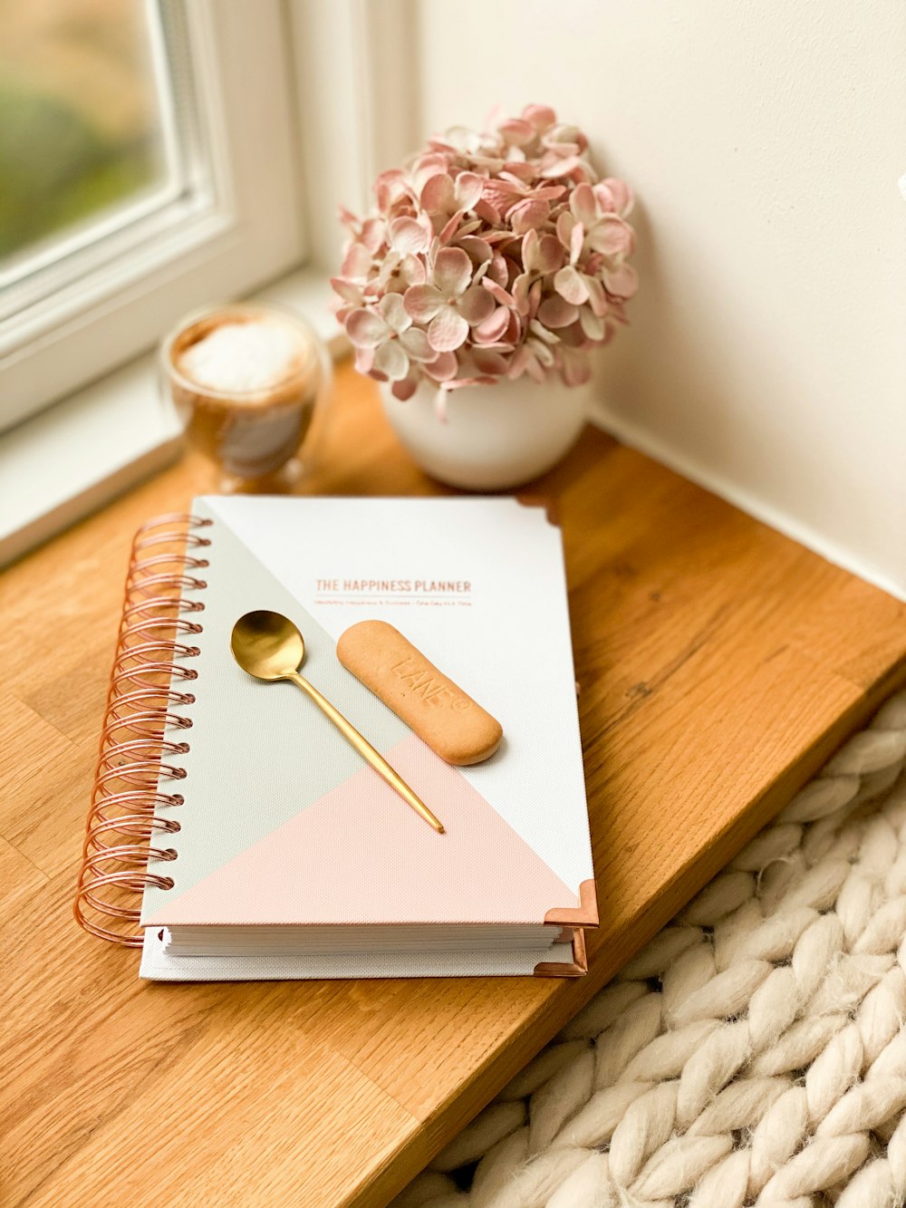 brown wooden chopsticks on white book page