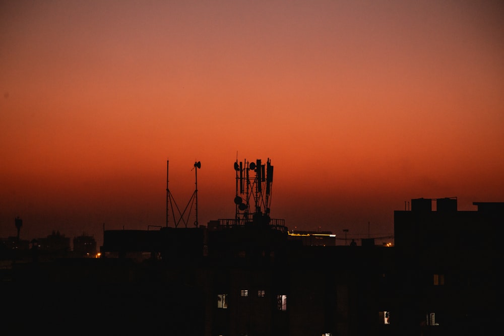 silhouette of building during sunset