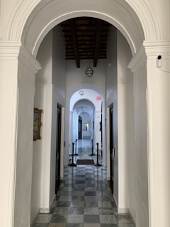 A beautifully designed marble feature wall in a hallway.