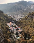 Lush green mountains surrounding the charming streets of Gramado in autumn