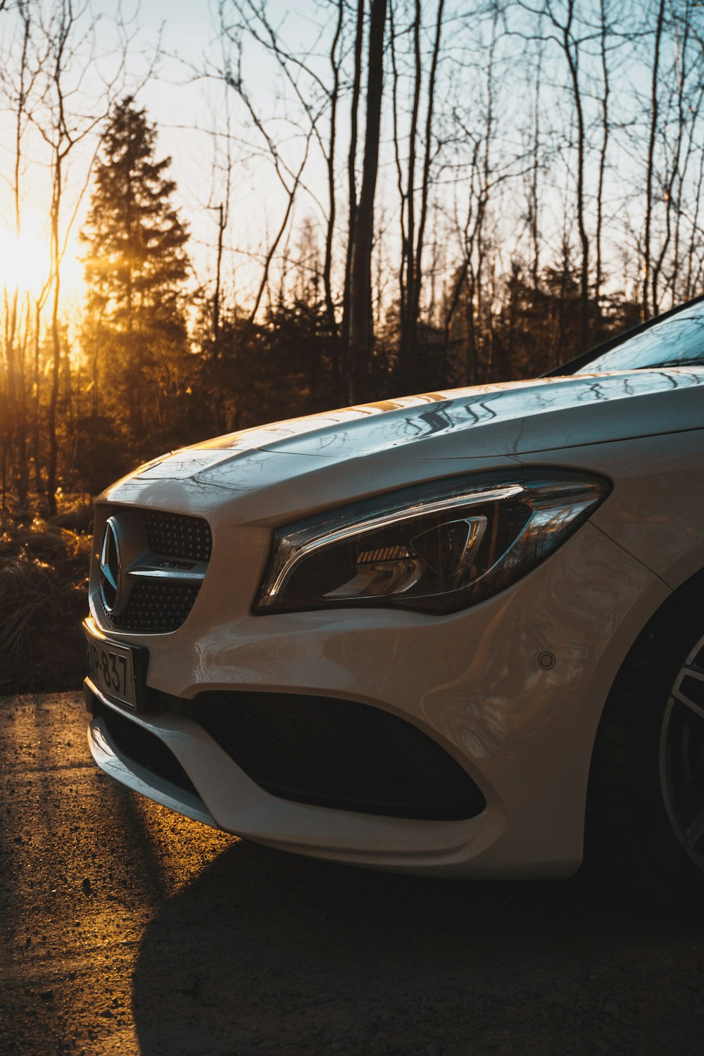 white and black mercedes benz car