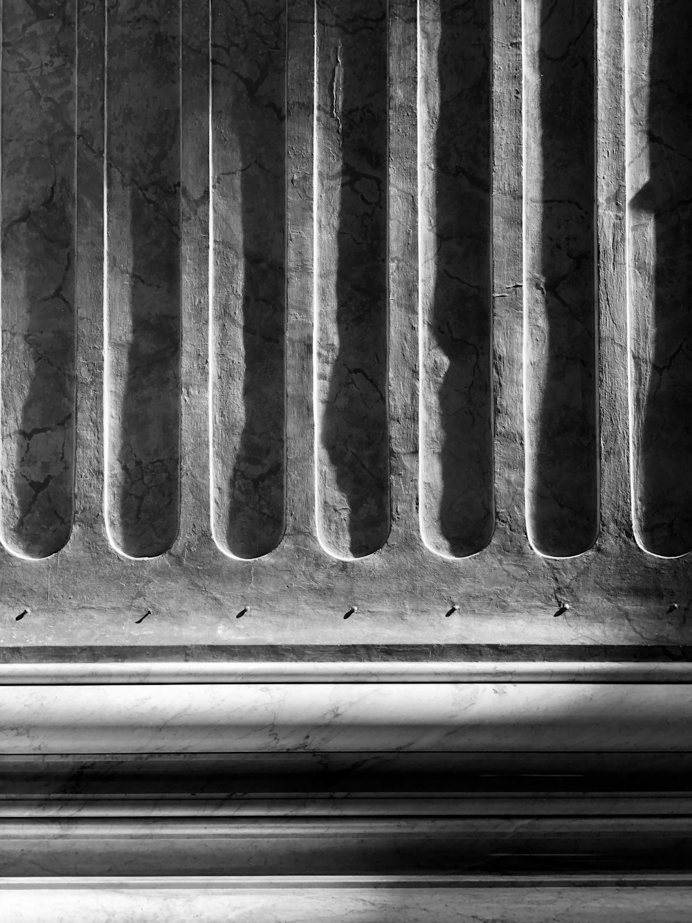 grayscale photo of wooden door