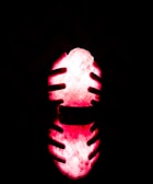 Close-up of hands releasing glowing light, representing energy liberation.